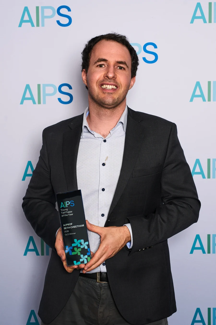 A/Prof. Seth Cheetham with the 2026 Queensland Young Tall Poppy of the Year award